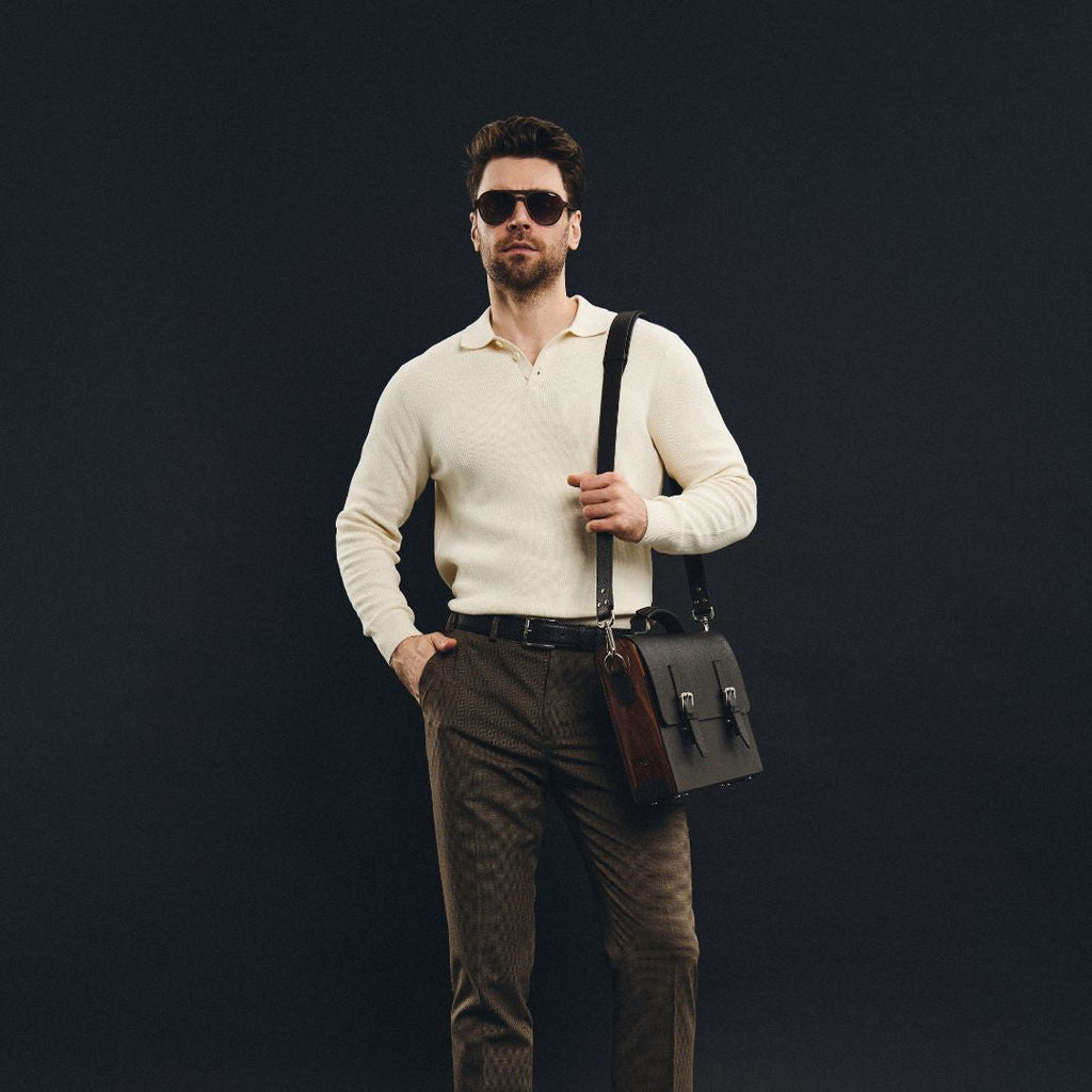 Model carrying BLACKWOOD Thunder Brown Epsom leather shoulder bag in a refined everyday outfit