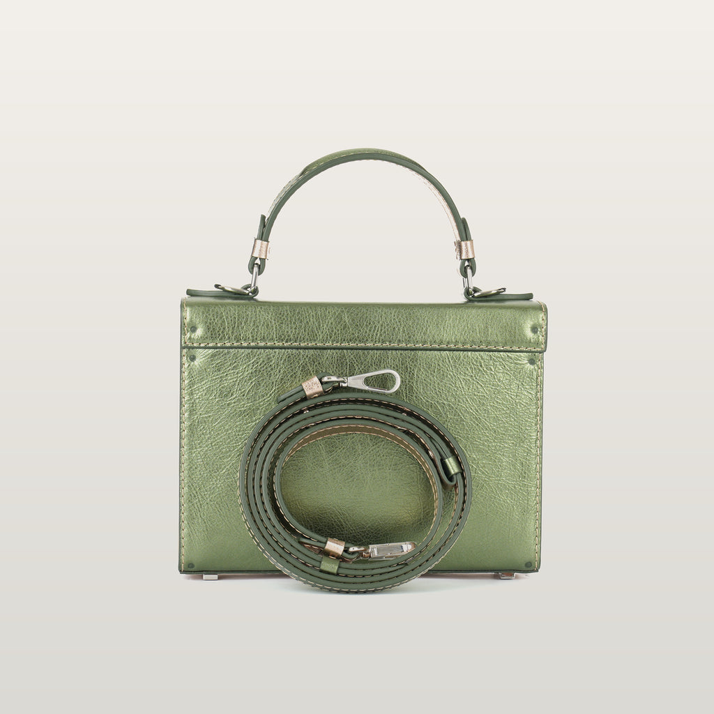 Back view of Fjord Mavka bag showing detachable leather crossbody strap and custom steel hardware