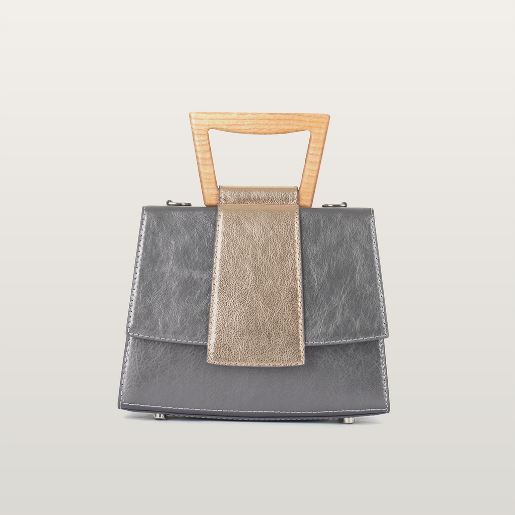 Front view of Sandy Povitrulia handbag in metallic grey Italian leather with champagne gold flap accent