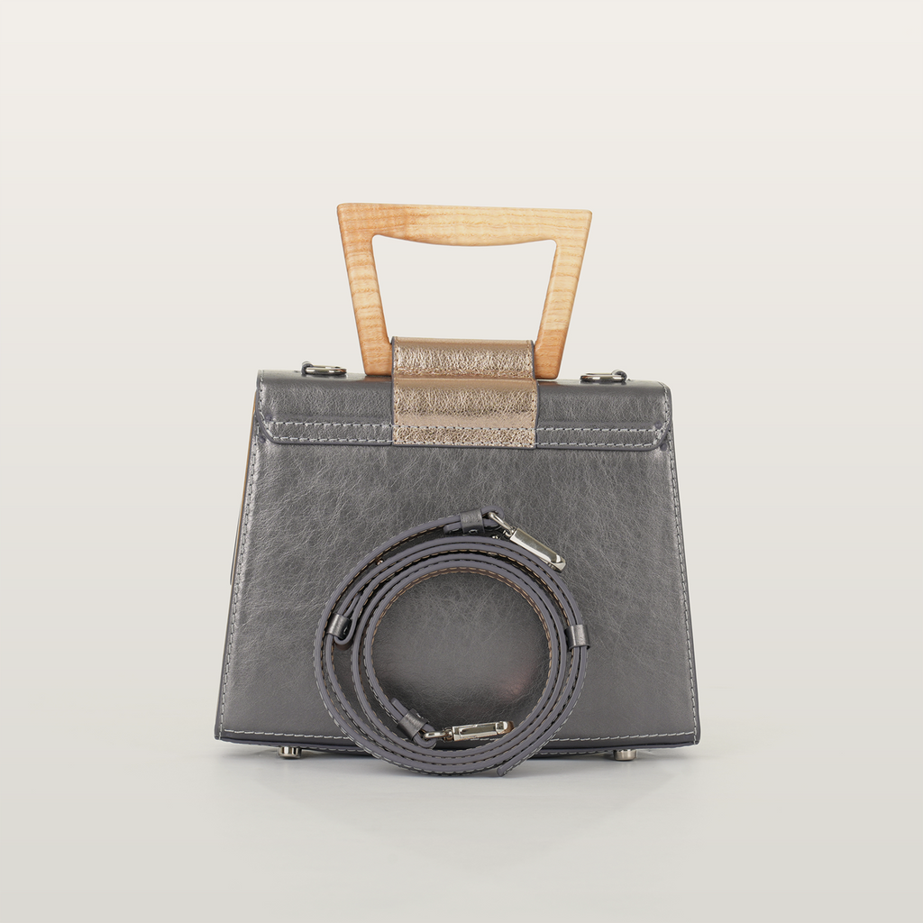 Back view of Sandy Povitrulia bag with coiled matching leather crossbody strap