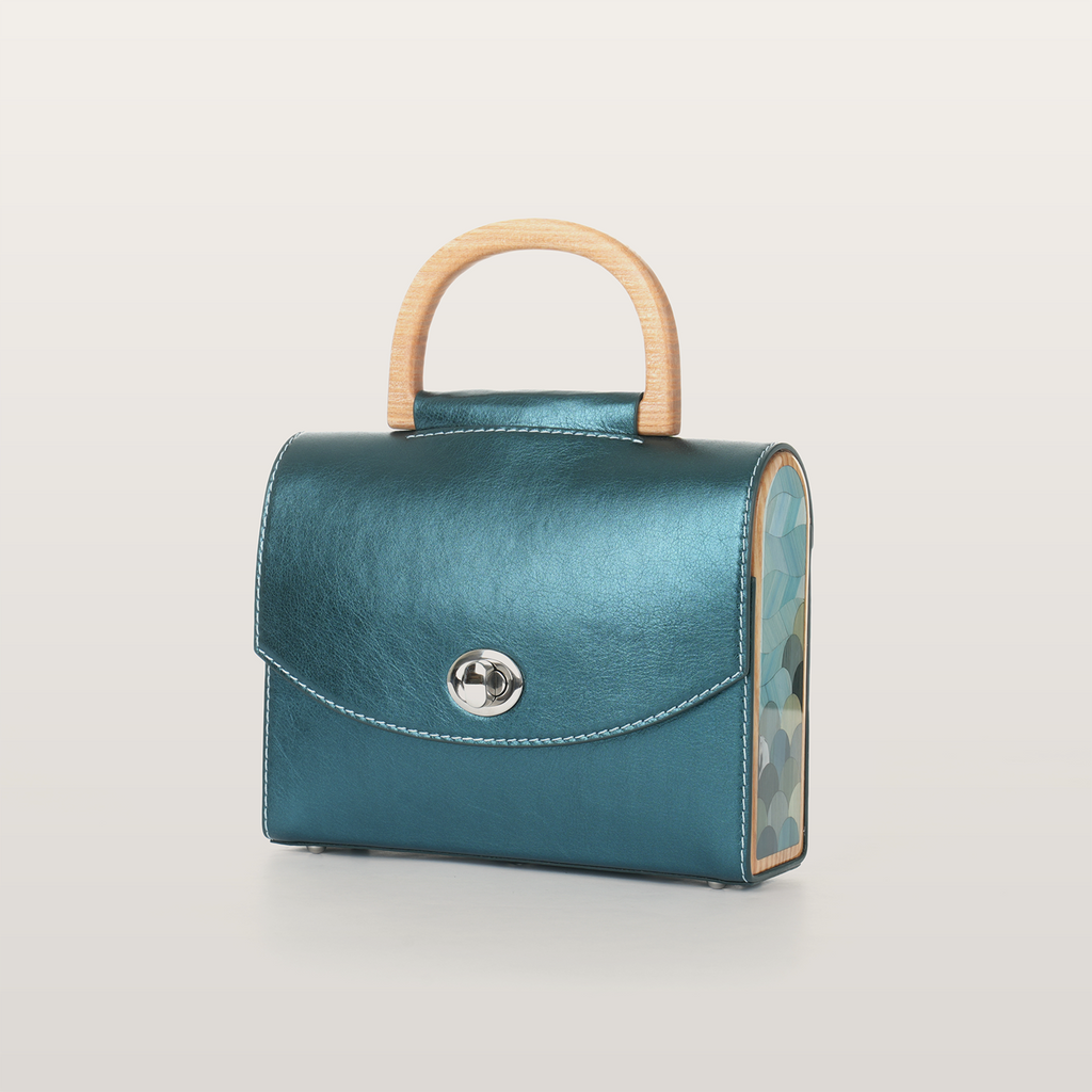 Aurora Vodianytsia teal blue leather handbag with solid ash wood and straw marquetry by BLACKWOOD x RUDA Studio
