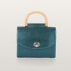 Front view of Aurora Vodianytsia structured handbag featuring carved wooden handle and Italian leather