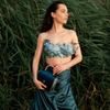 Model holding the limited edition ANIMA Aurora Vodianytsia handbag handcrafted by BLACKWOOD