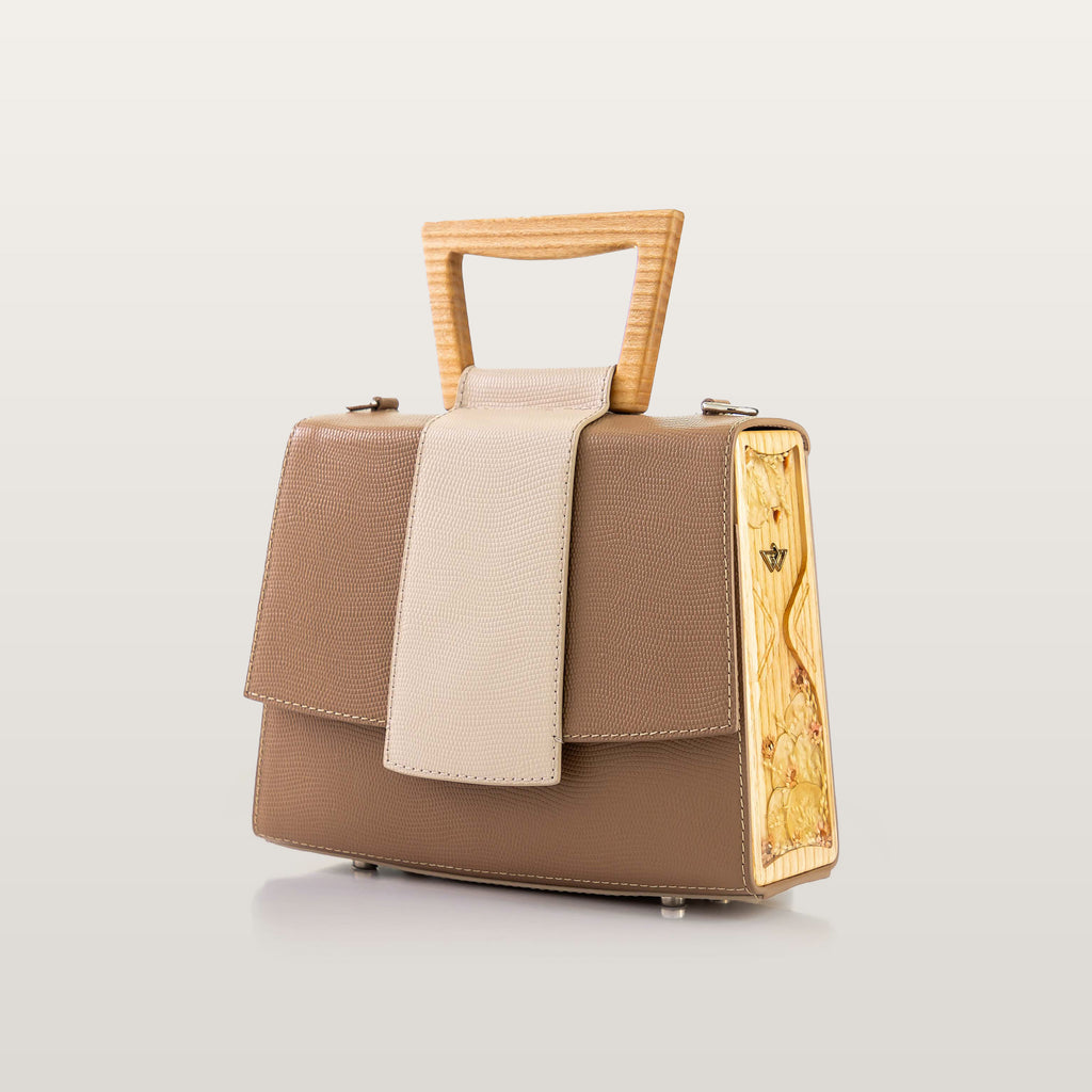 Brown handbag with beige strap and wooden handle 