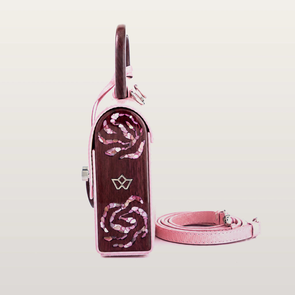 Side view of BLACKWOOD Aurora Purple Heart Shiny Rose handbag with wooden panel and detachable strap