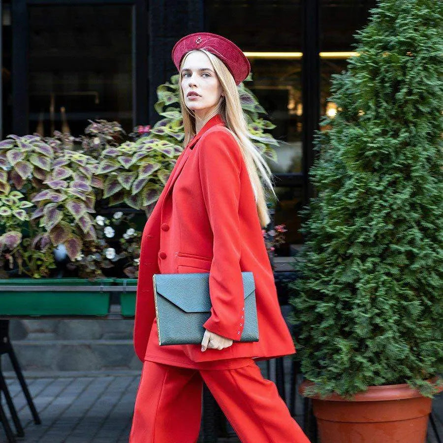 Green Saffiano MacBook case worn as a refined accessory by BLACKWOOD Atelier
