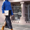 Beige Saffiano MacBook case worn as a refined accessory by BLACKWOOD Atelier